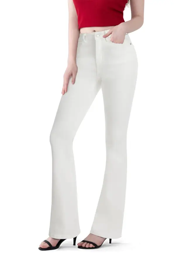 White curvy bootcut flare jeans shown from the front with a red top and black heels.